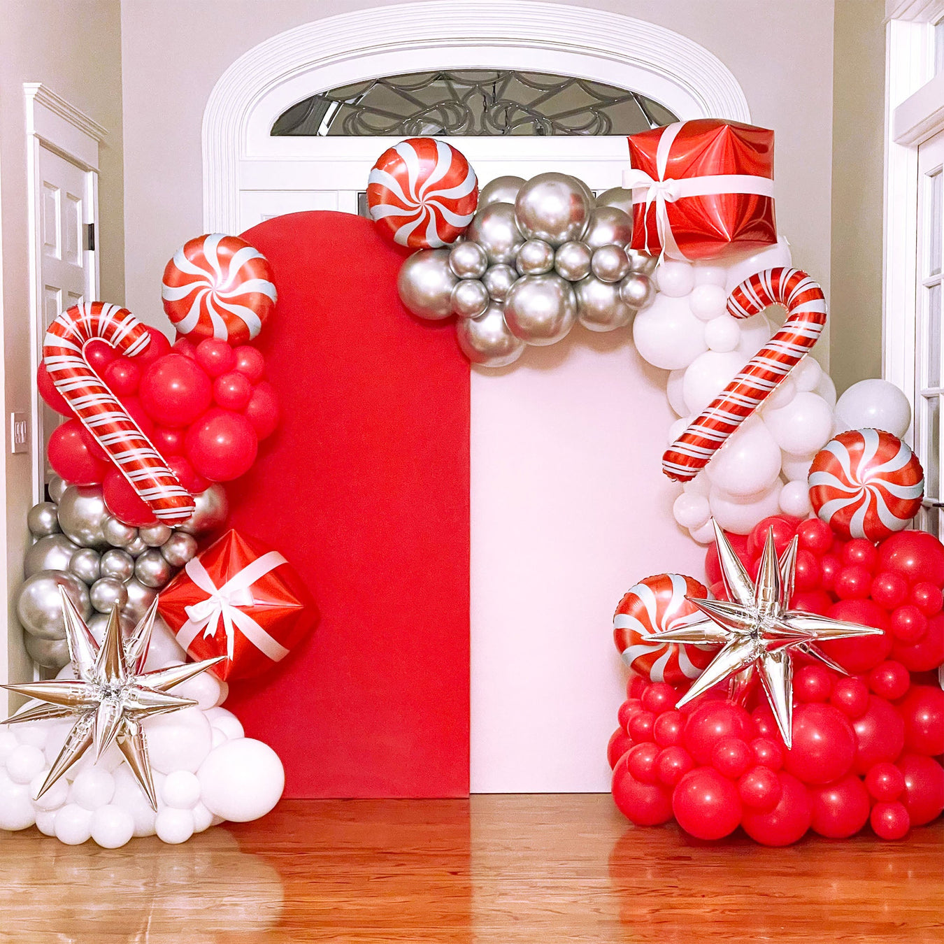 Red and White Christmas Balloons Arch and Garland Kit with Candy Cane, Pinwheel Candy Balloons, Gift Balloons and Silver Stars