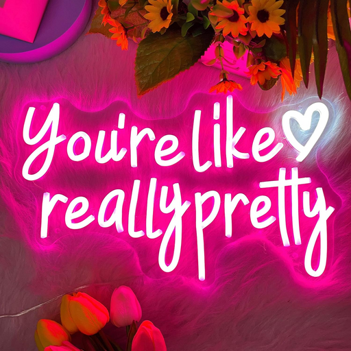 Custom neon sign in bedroom with 'You Are Really Pretty' message - personalized neon lights for bedroom or nursery.